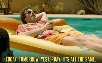 Andy Samberg lying on a pizza-shaped floatie in a pool, drinking a beer, saying &#x27;today. tomorrow. yesterday. it&#x27;s all the same&#x27;