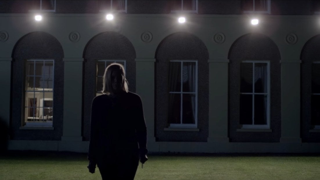 A woman attempts to search for someone on her lawn at night in &quot;Don&#x27;t Knock Twice&quot;