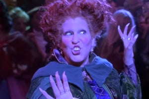 bette midler in hocus pocus and two people in a theater audience clapping