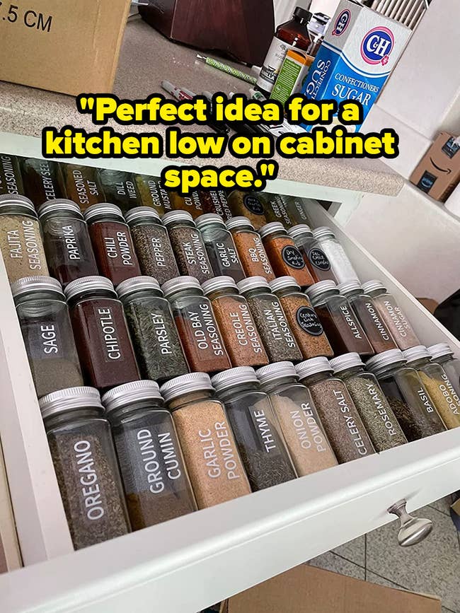 Spices in a drawer using a drawer tray organizer with the caption 