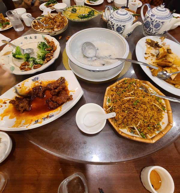 multiple dishes on table at Congee Village
