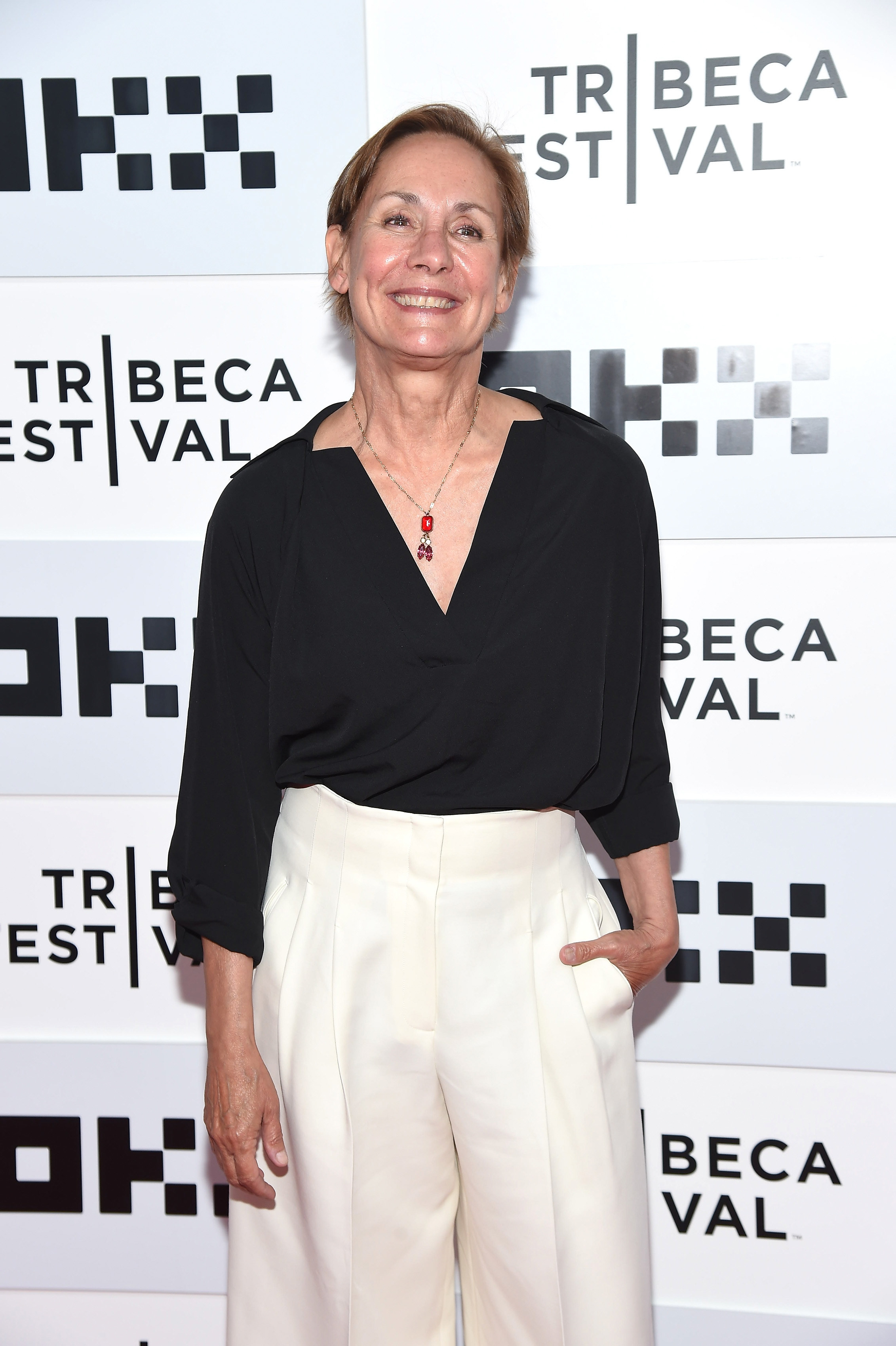 Laurie smiling on the red carpet