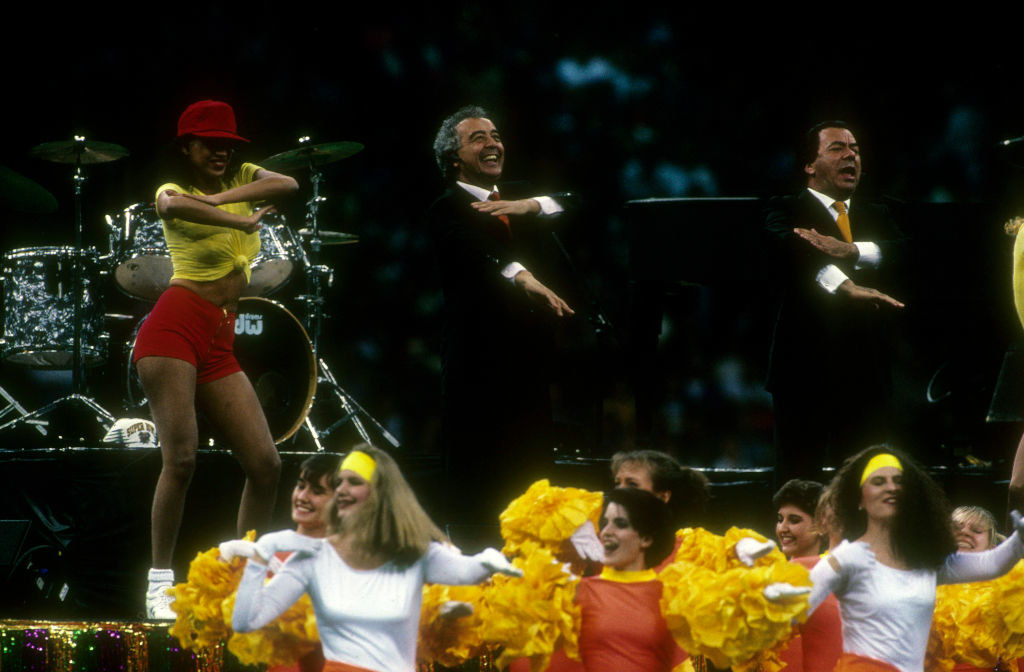 Los Del Río performing with dancers