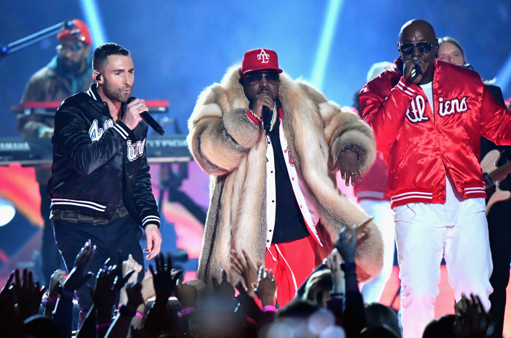 Adam and Big Boi performing