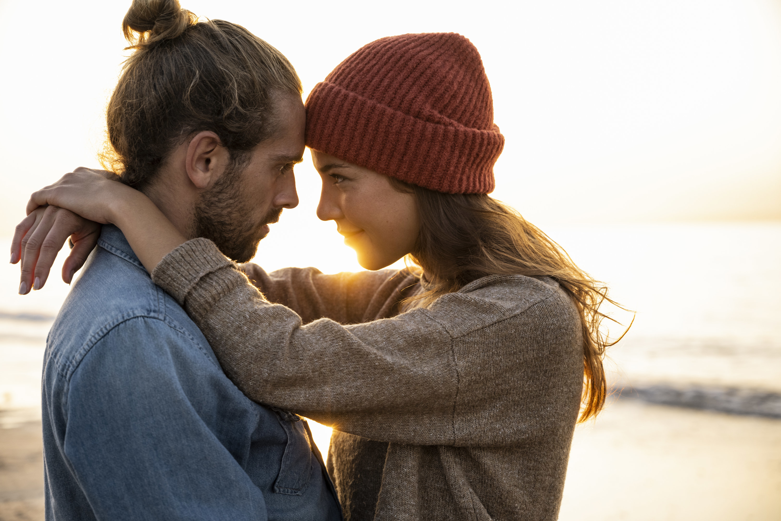 A couple in love embraces on the beach