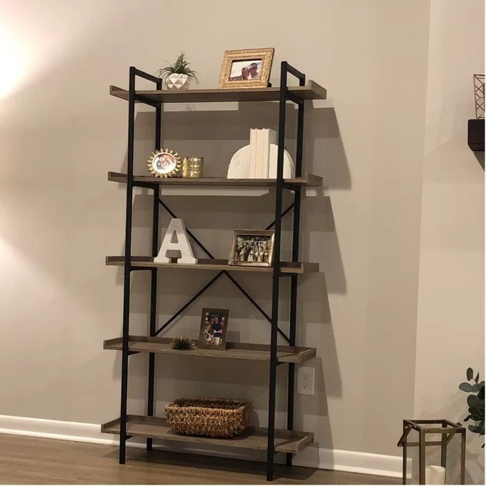 a reviewer photo of the shelf with knickknacks on it