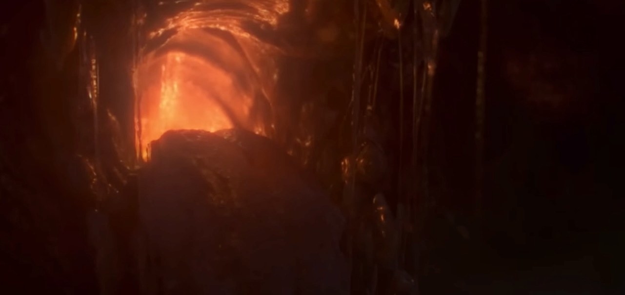A close-up of a dragon&#x27;s throat with fire in it