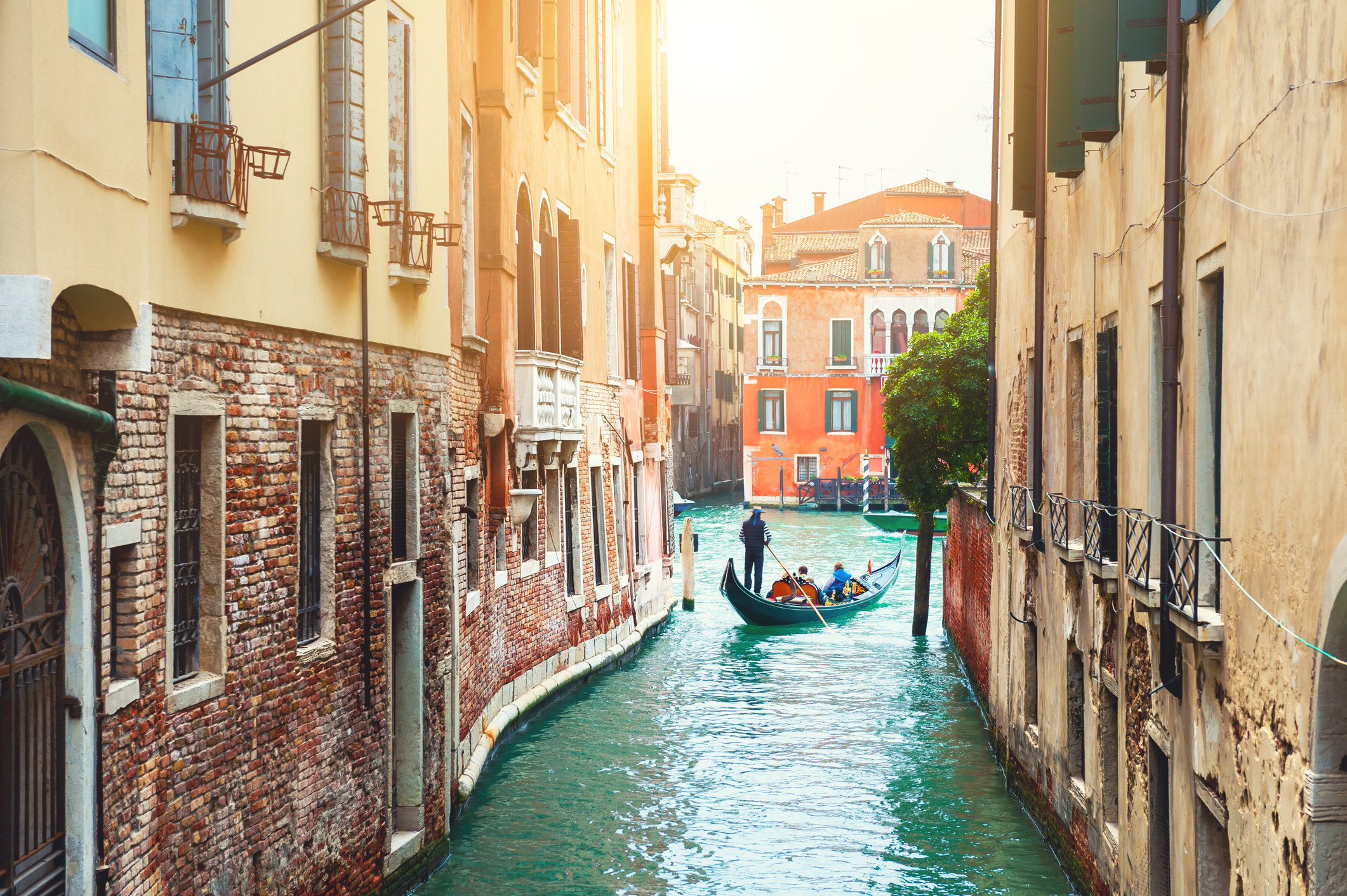 A gondola moving through Venice