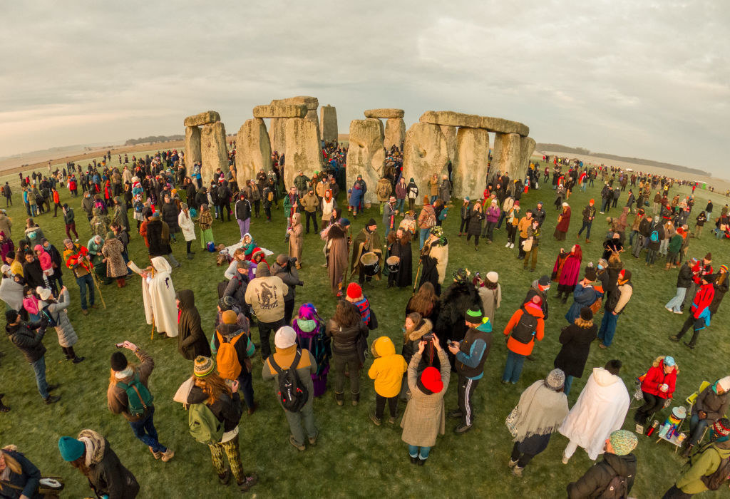 Tourists walking around Stonehenge