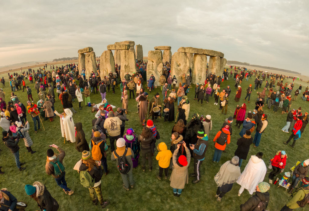 tourists walking around Stone Henge