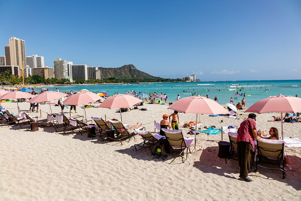 Pink umbrellas at Waikiki Beach