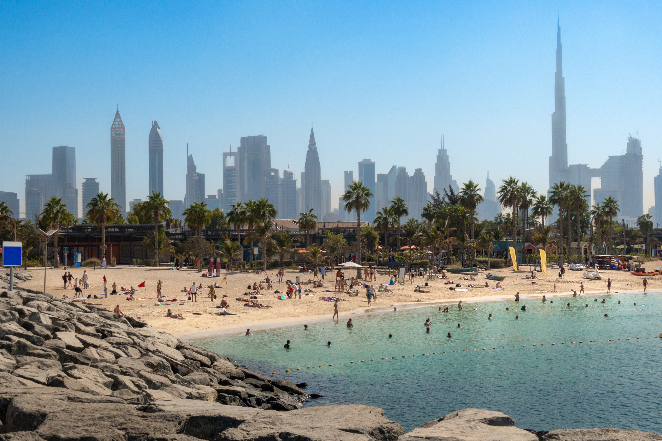 A beach and the Dubai skyline