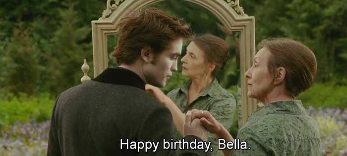 Older Bella and reaching towards a younger Edward telling her &quot;Happy birthday, Bella&quot;