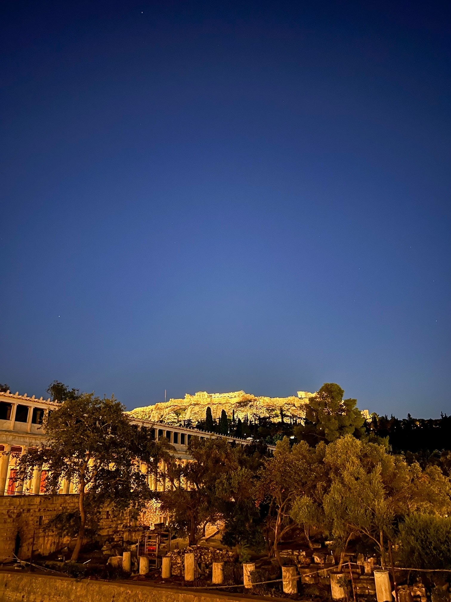 The Acropolis lit up at night.