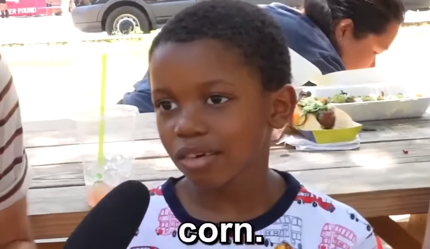 A young kid explaining his love of corn