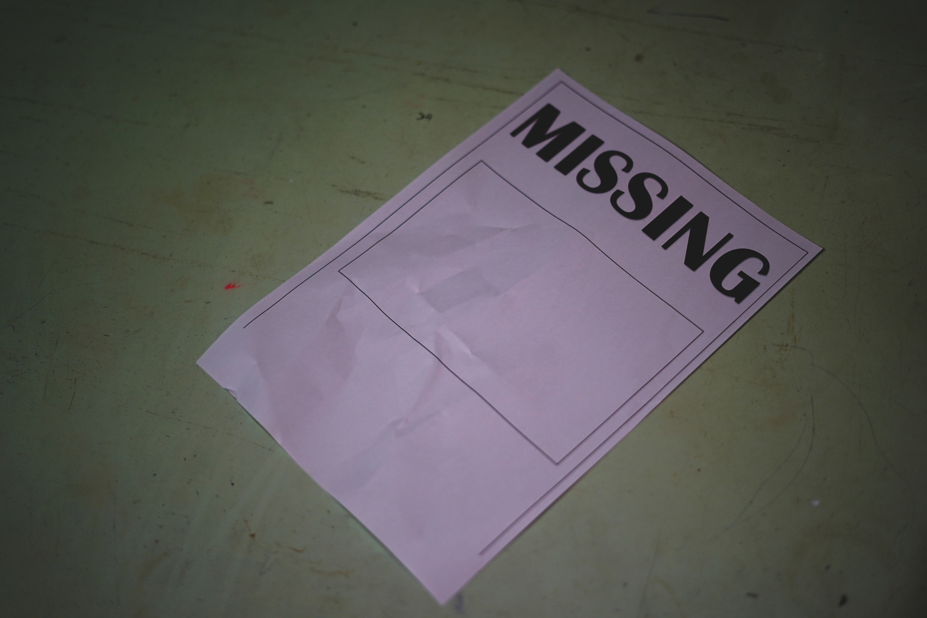 a piece of paper that says missing