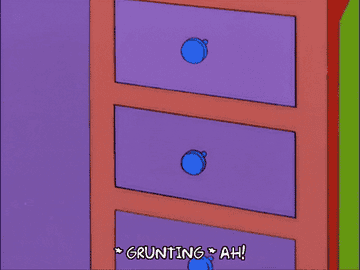 Homer Simpson sorting through drawers with the caption &quot;*Grunting* Ah!&quot;