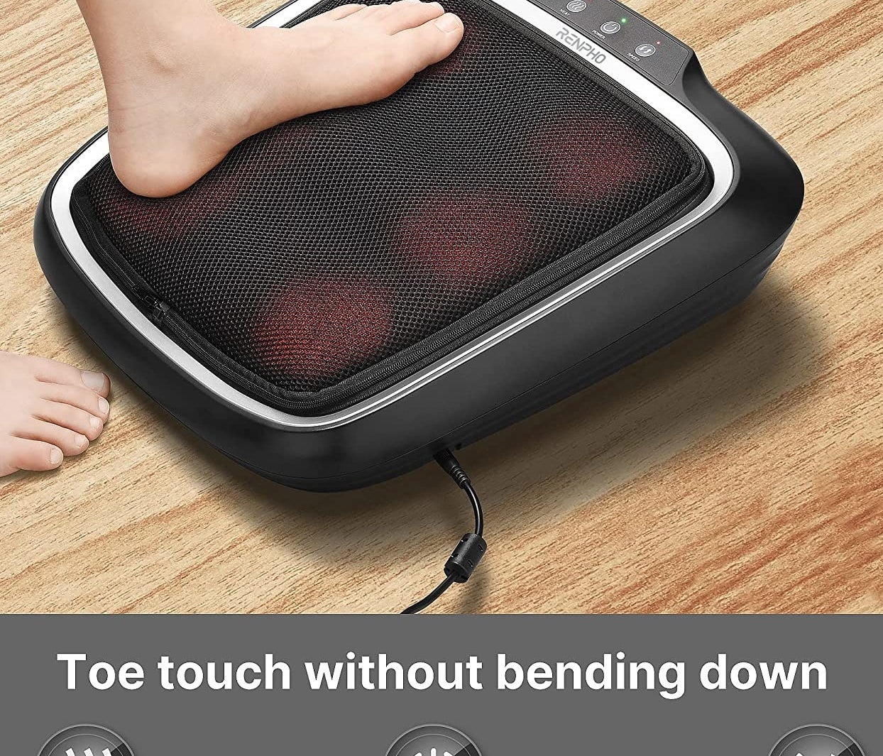 a person with their foot on the foot massaging device