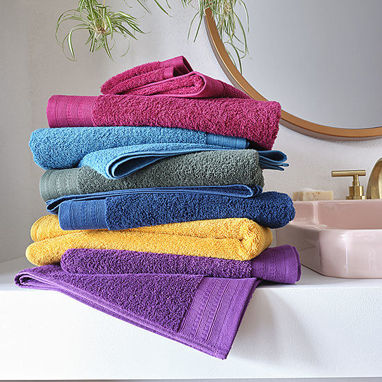 a stack of colorful towels