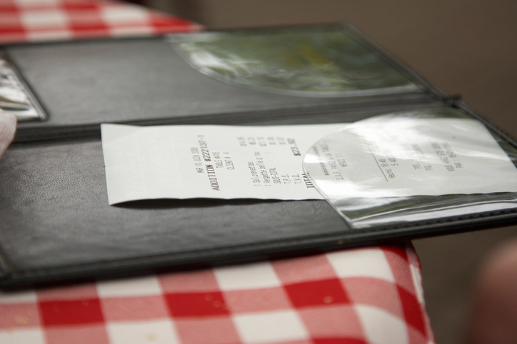 A restaurant receipt on a table