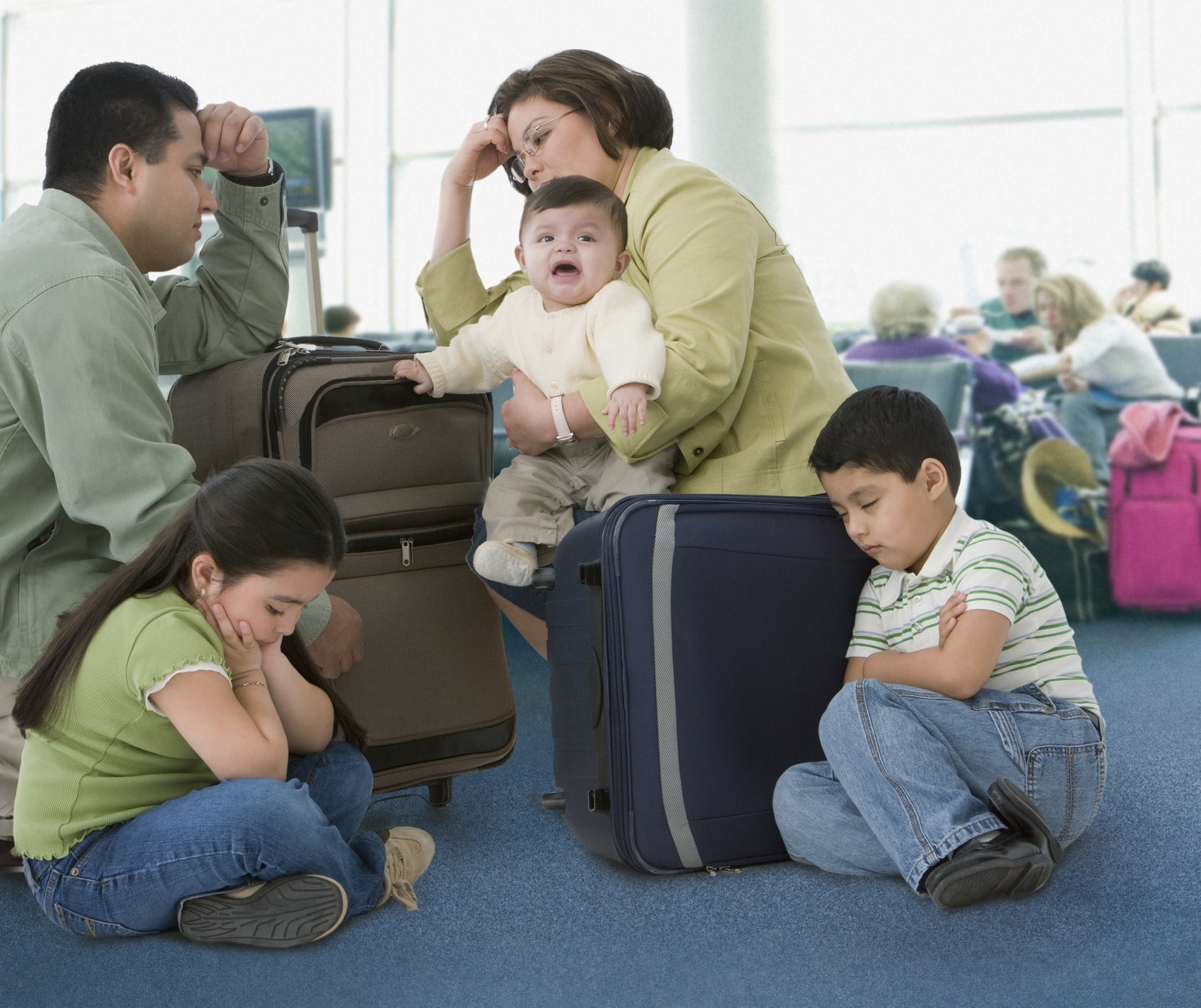 stressed family in airport