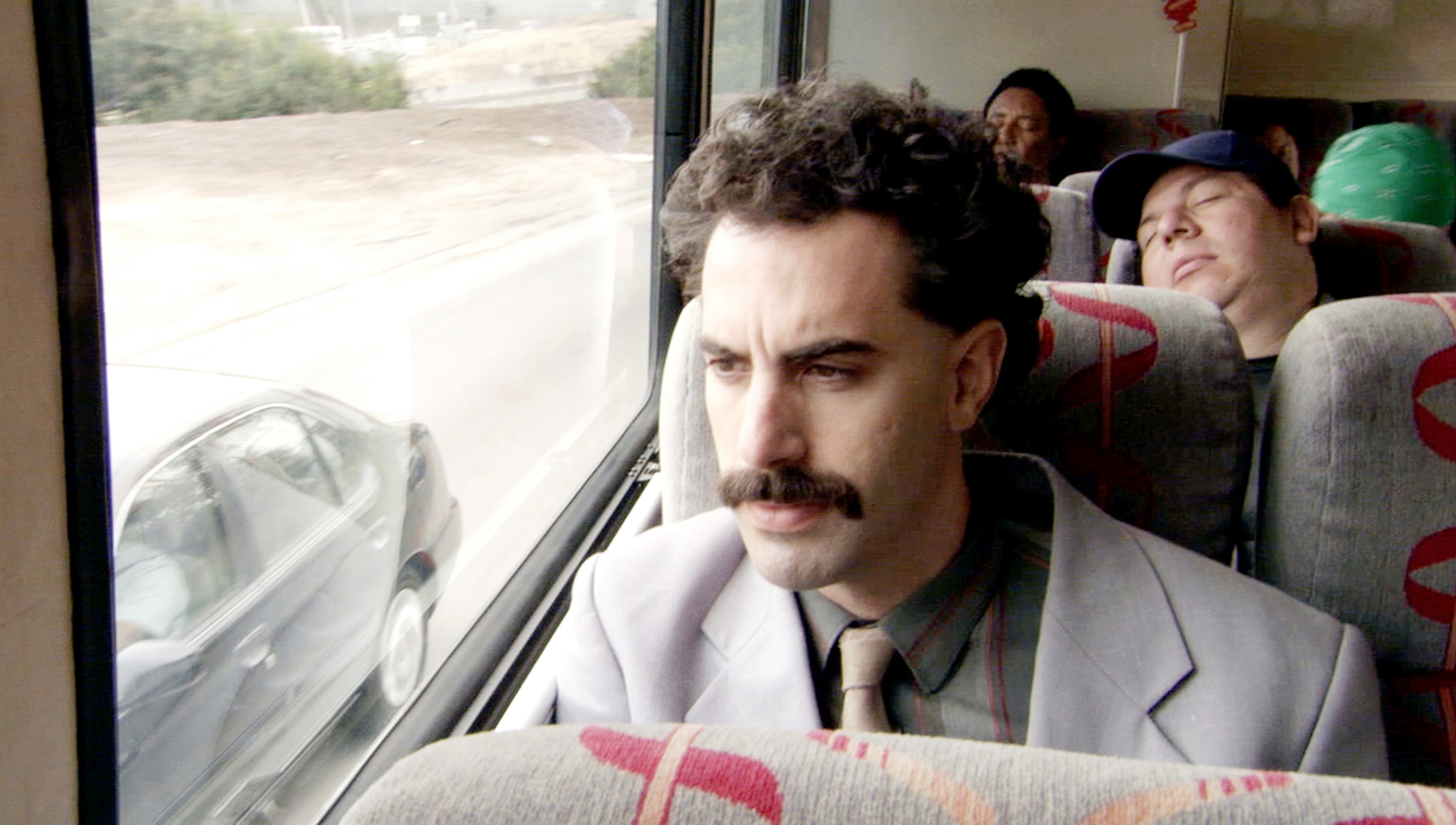 Borat rides a bus