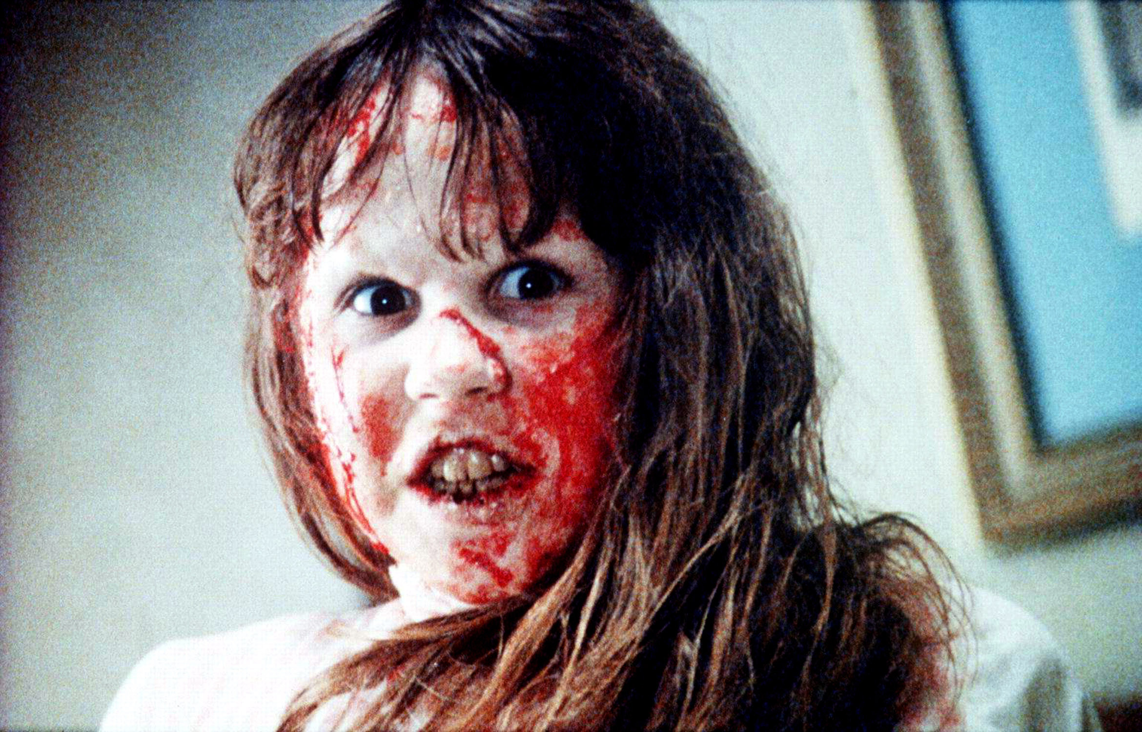 Linda Blair with blood on her face