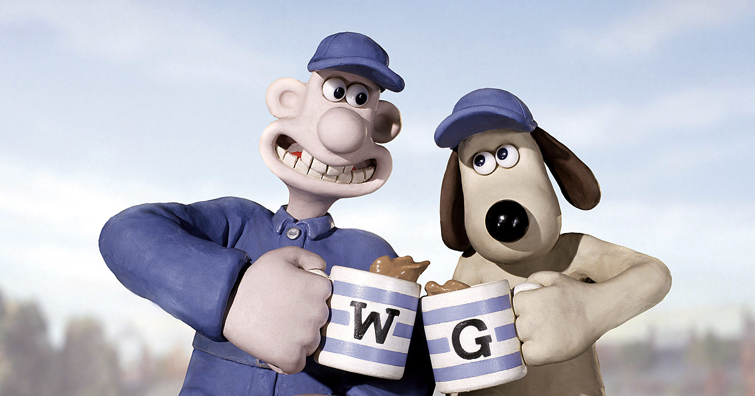 Wallace and Gromit put their mugs together