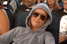 amy poehler in a hoodie chewing gum just chillin