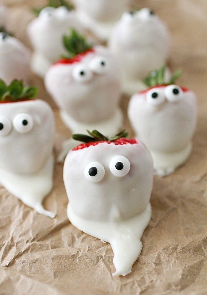 White chocolate covered strawberry &quot;ghosts.&quot;
