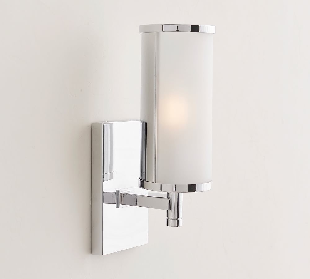silver and white wall sconce