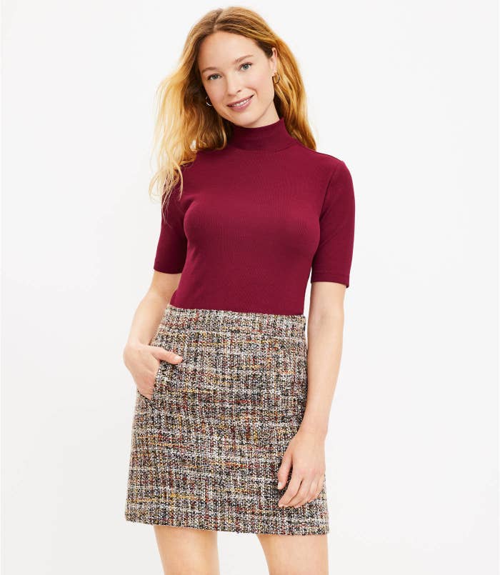 A model wears the skirt
