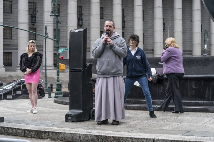 Moscinski speaks into a microphone