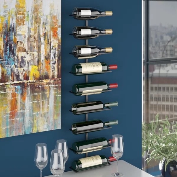 The wine rack with bottles in it