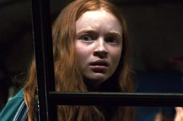 sadie sink has brows furrowed and mouth slightly open