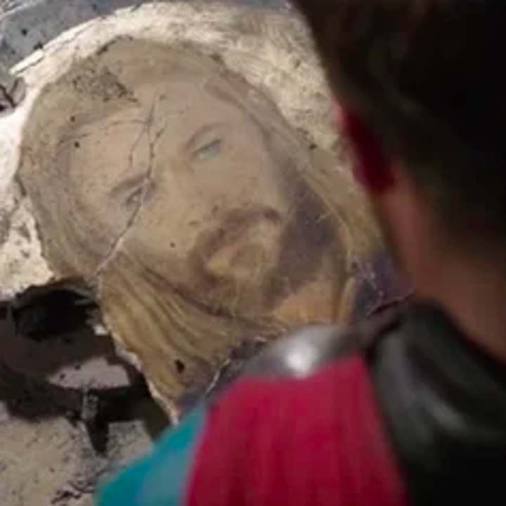 A mural of Thor with his right eye cracked