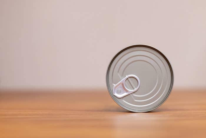 a can laying on its side on a counter