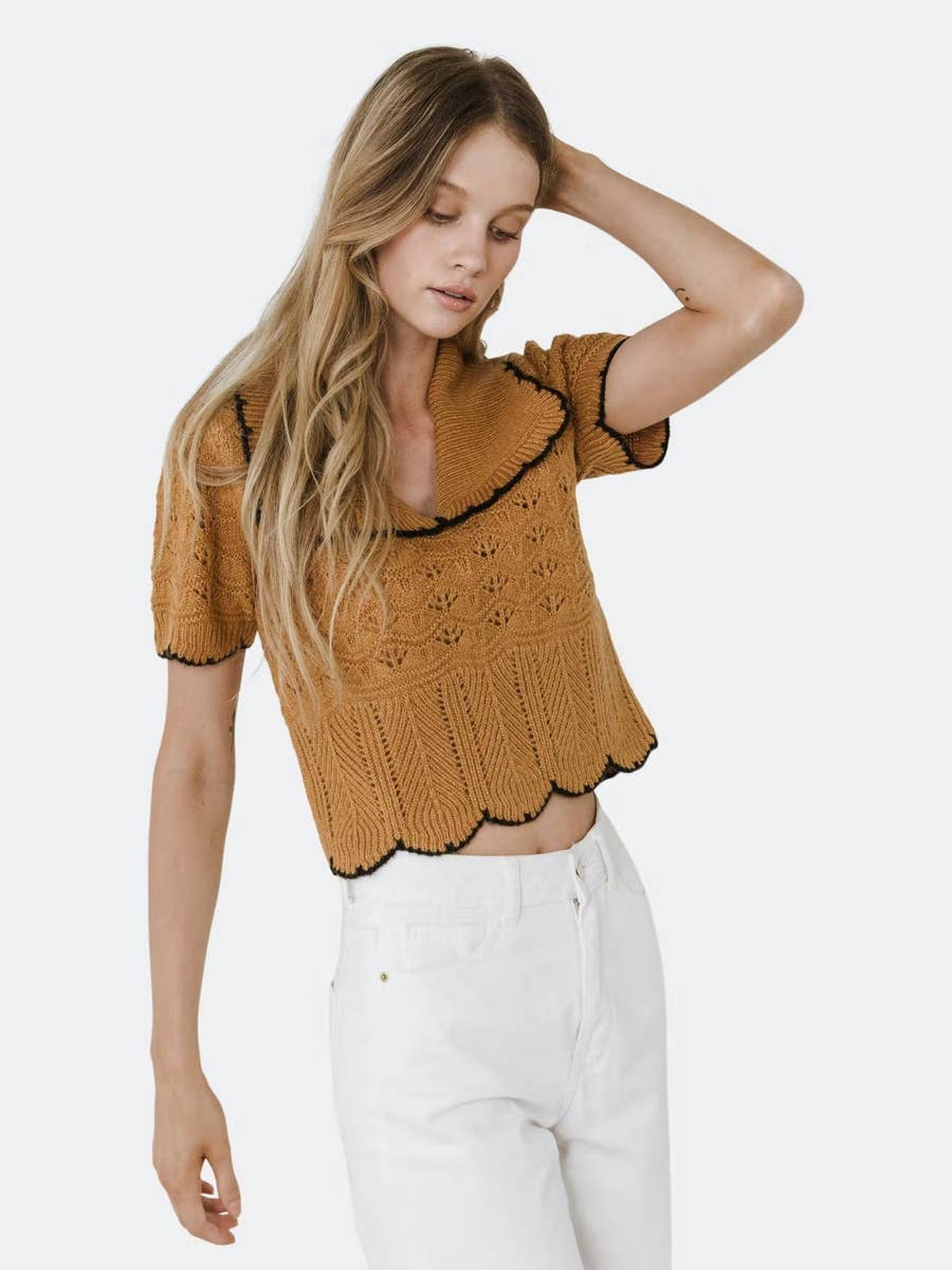 A puff-sleeve top looks perfect juxtaposed with cargo jeans