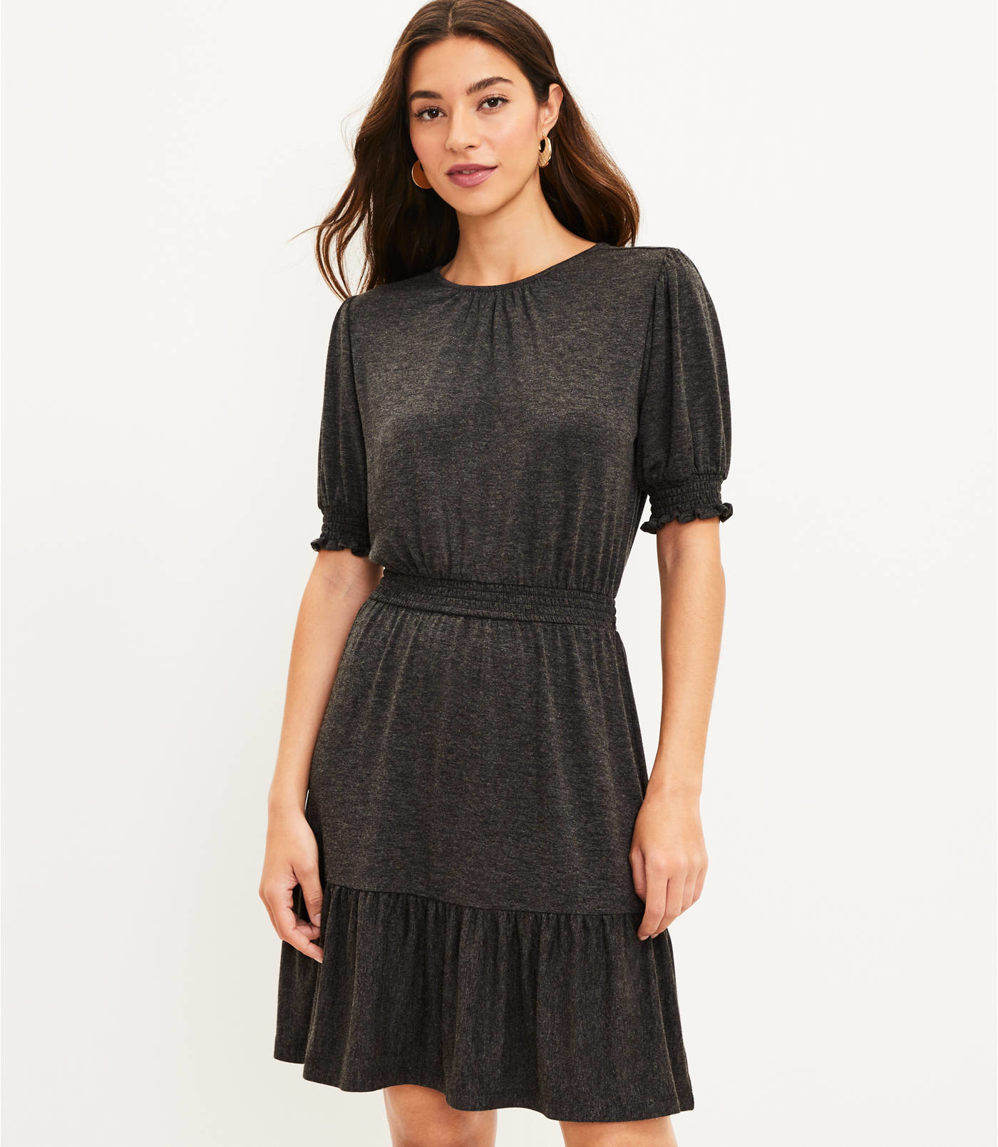 A model wears the dress in charcoal