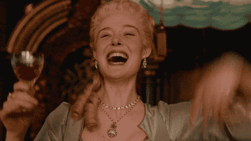 GIF of Elle Fanning as Catherine the Great in The Great yelling Huzzah