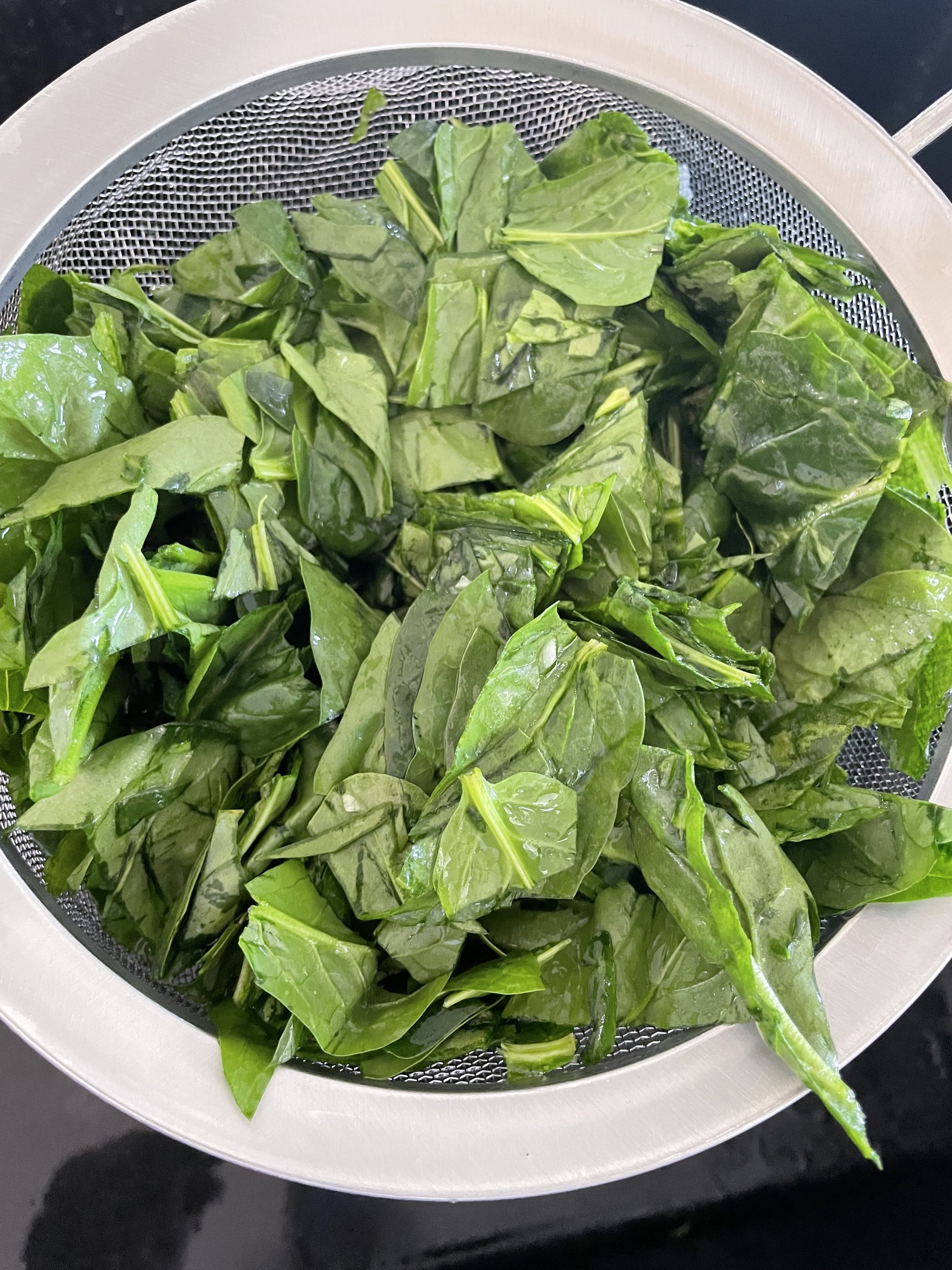 A strainer of spinach