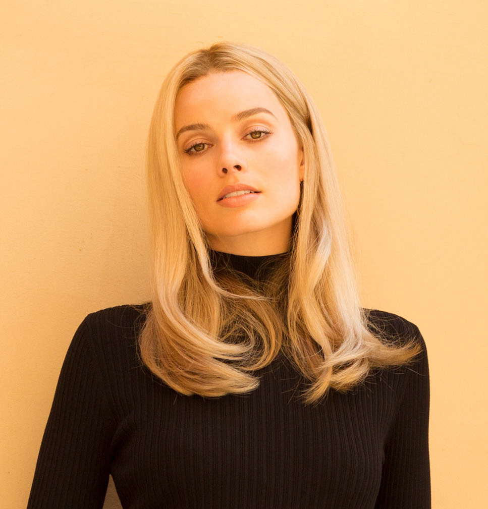 Margot as Sharon in a turtleneck