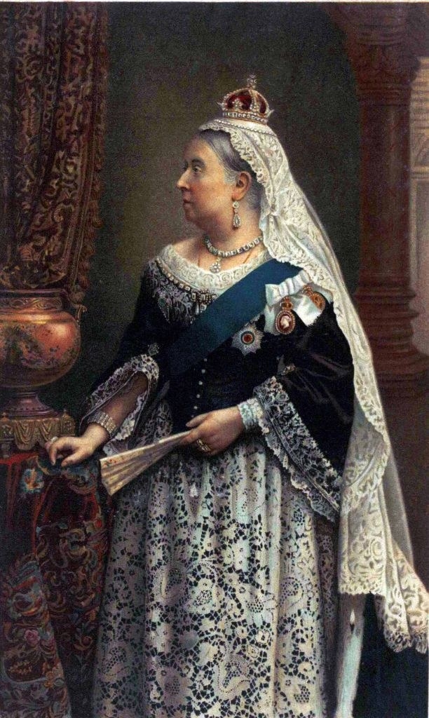 A painting of Victoria in an ornate gown and wearing a crown and flowing headdress