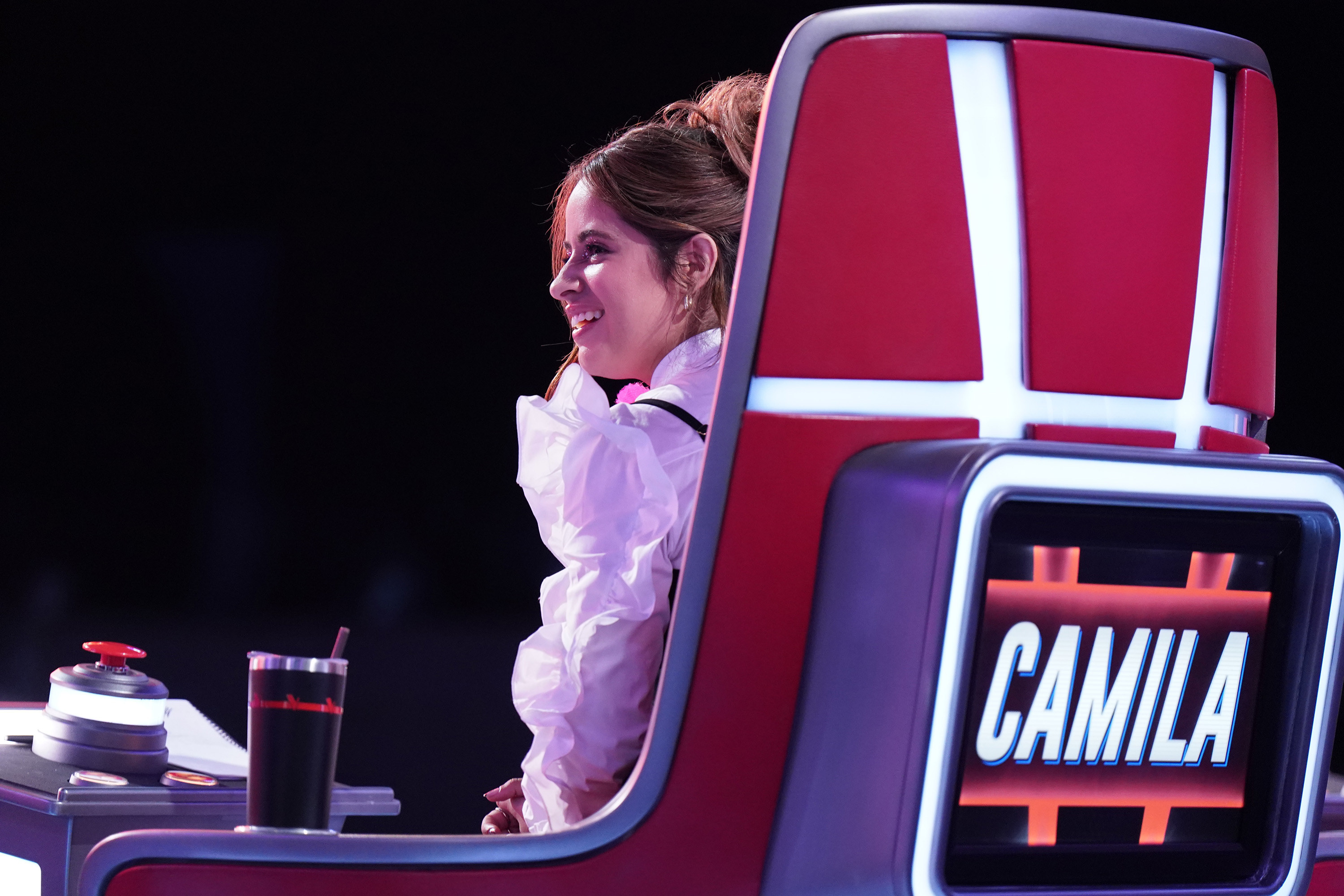 Camila laughing on The Voice