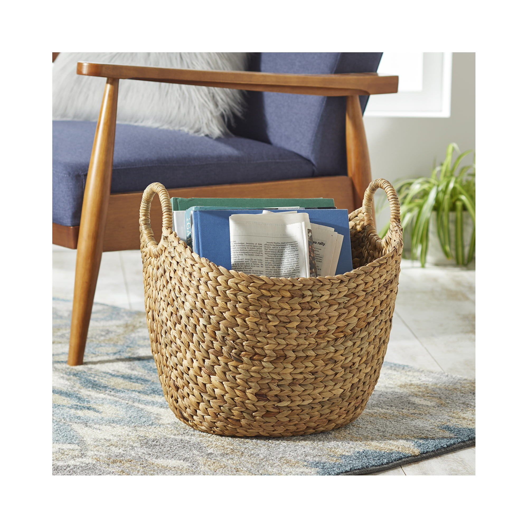woven boat basket holding reading materials