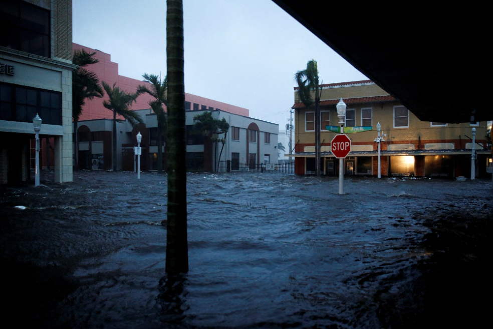 A completely flooded suburban intersection