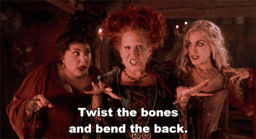 Winnie sanderson says twist the bones and bend the back flanked by her sisters in hocus pocus 1