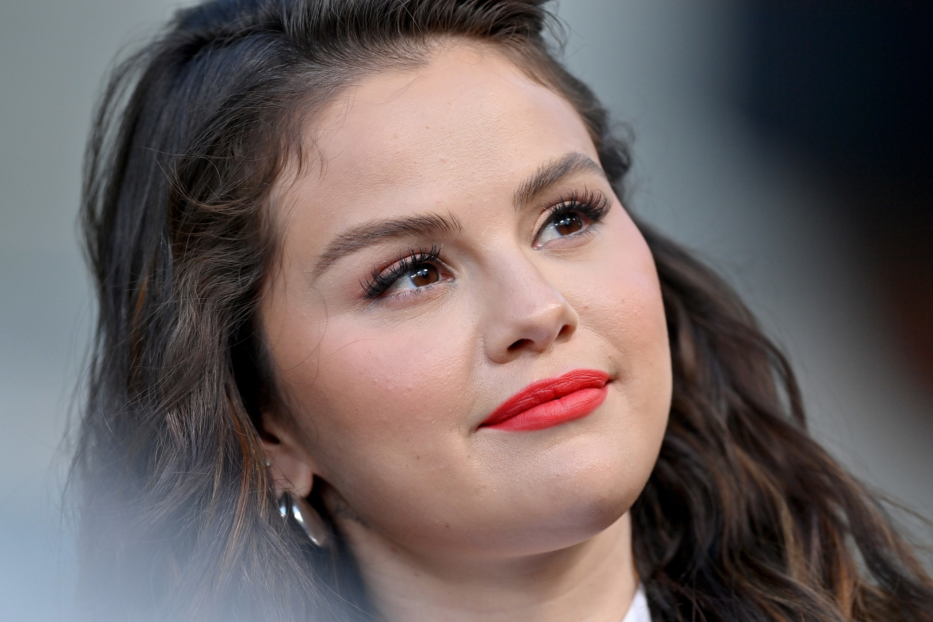 Close-up of Selena looking up