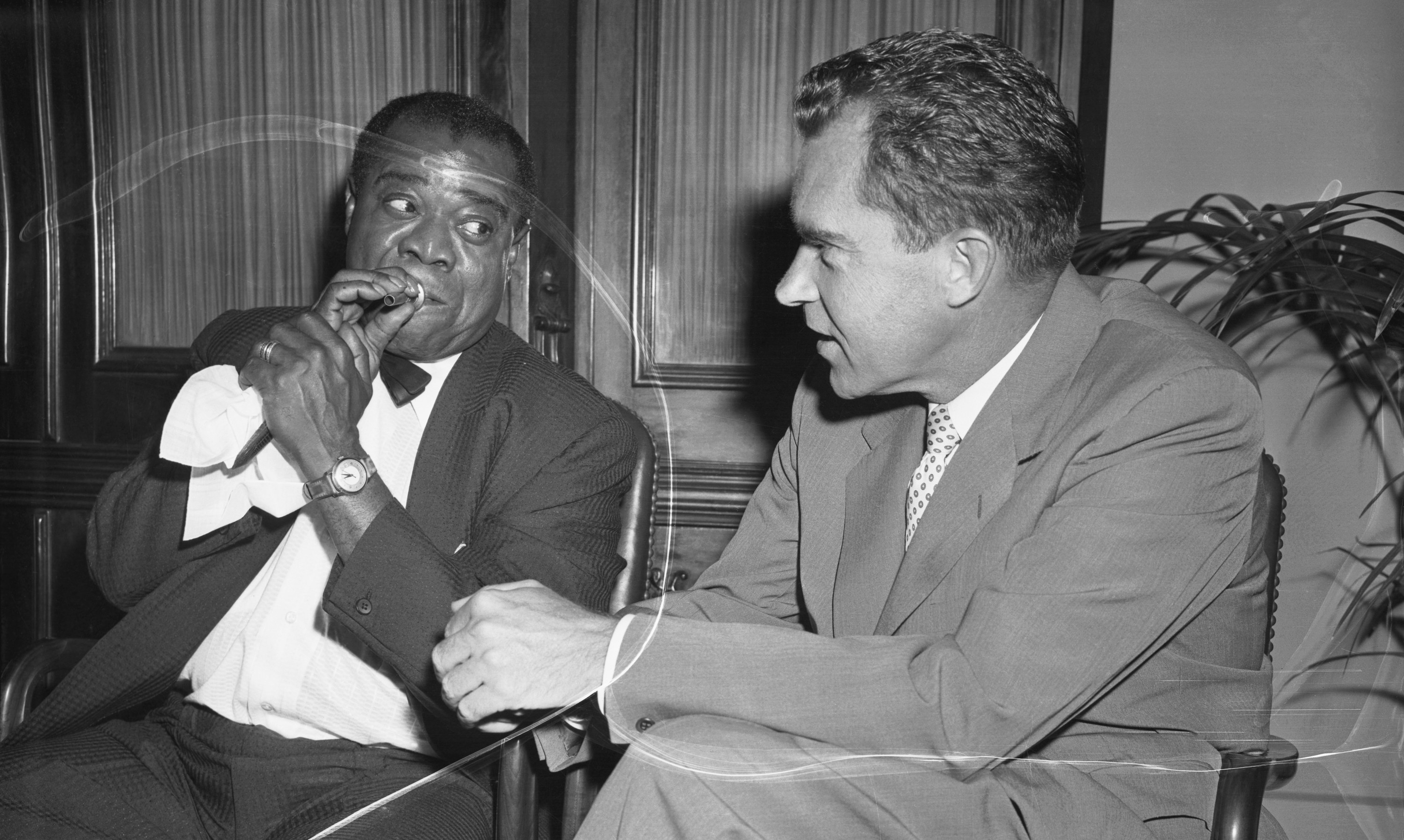 Armstrong and Nixon sitting together