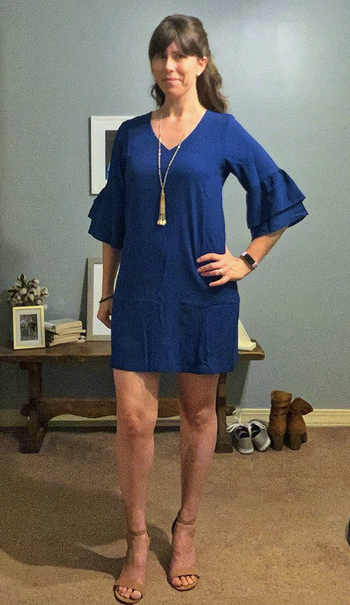 reviewer wearing the dress